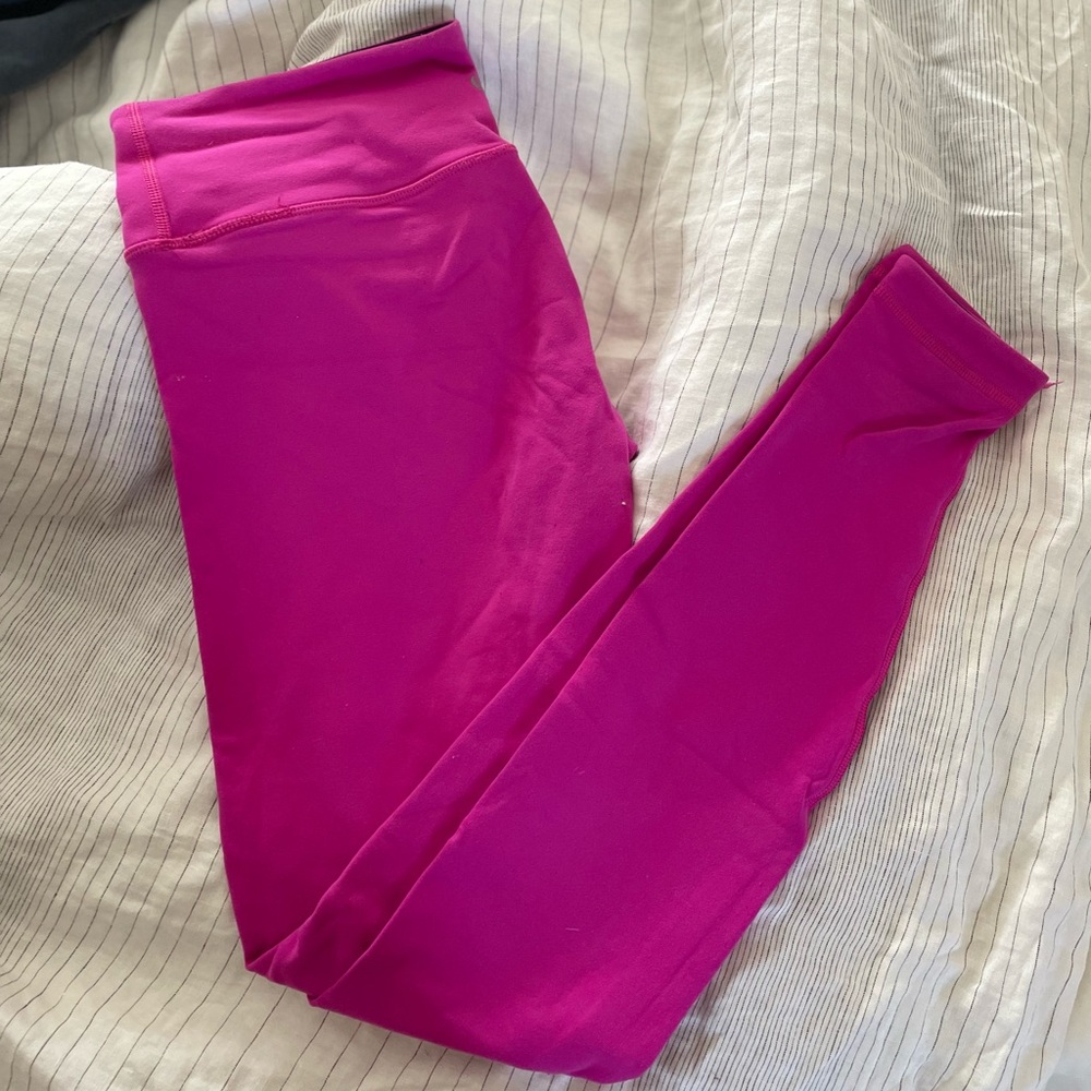 Hot pink and black reversible Lululemon leggings
